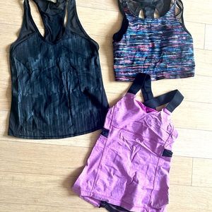 Bundle of 4 lululemon: 2 tank tops, 1 tank bra, 1 half zip long sleeve jacket